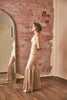 RoubaG's gold-ivory flared pants jumpsuit with honeycomb cuts and open back